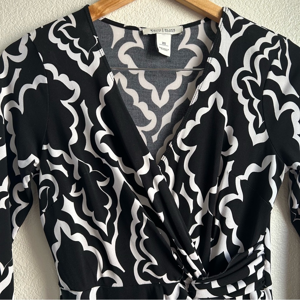 White House Black Market | Black and White Patterned Faux Wrap Mini Dress - Picture 4 of 8